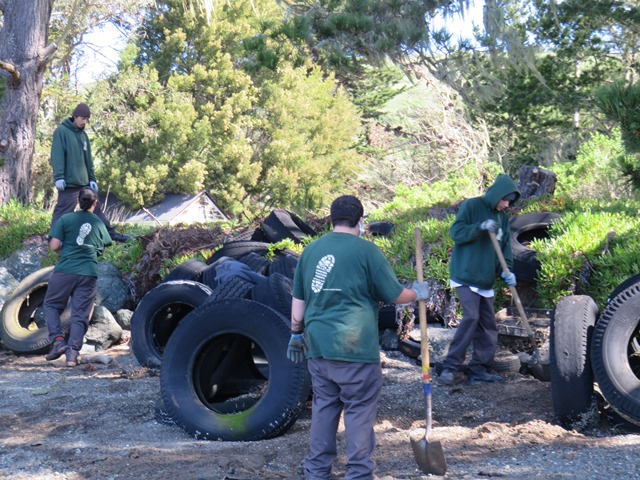 CCNB crew cleaning up abandoned tires at Marconi Cove, Tomales Bay ©Brandon Benton - Conservation Corps North Bay